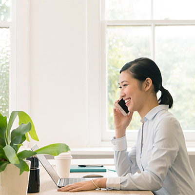 TBA Young Business Woman Office Phone 400X400